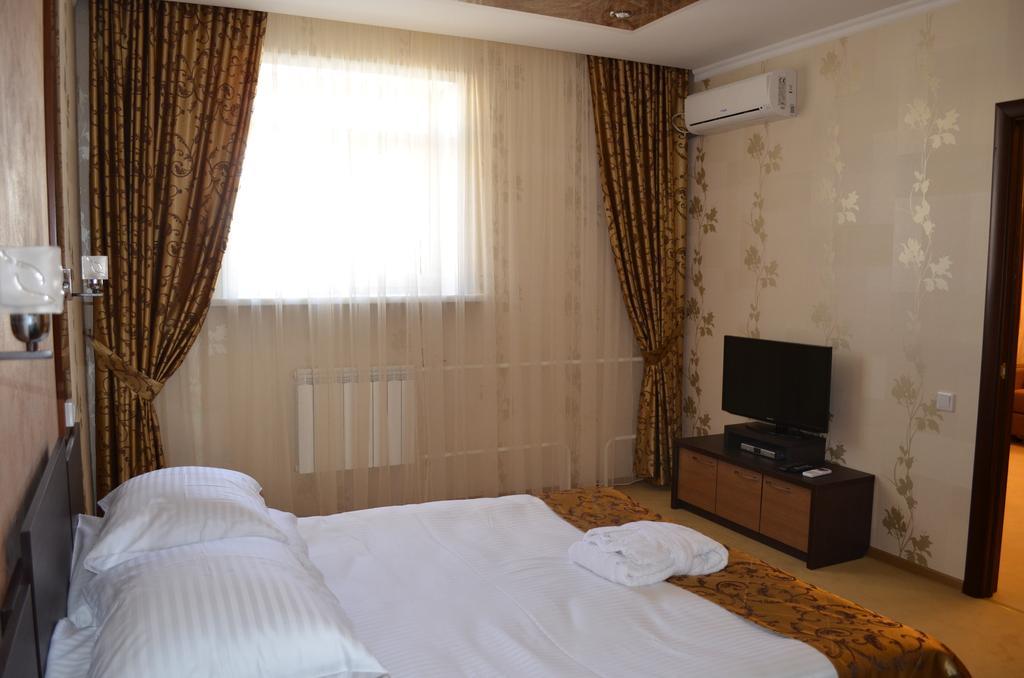 Mereke Hotel Ustʼ-Kamenogorsk Zimmer foto